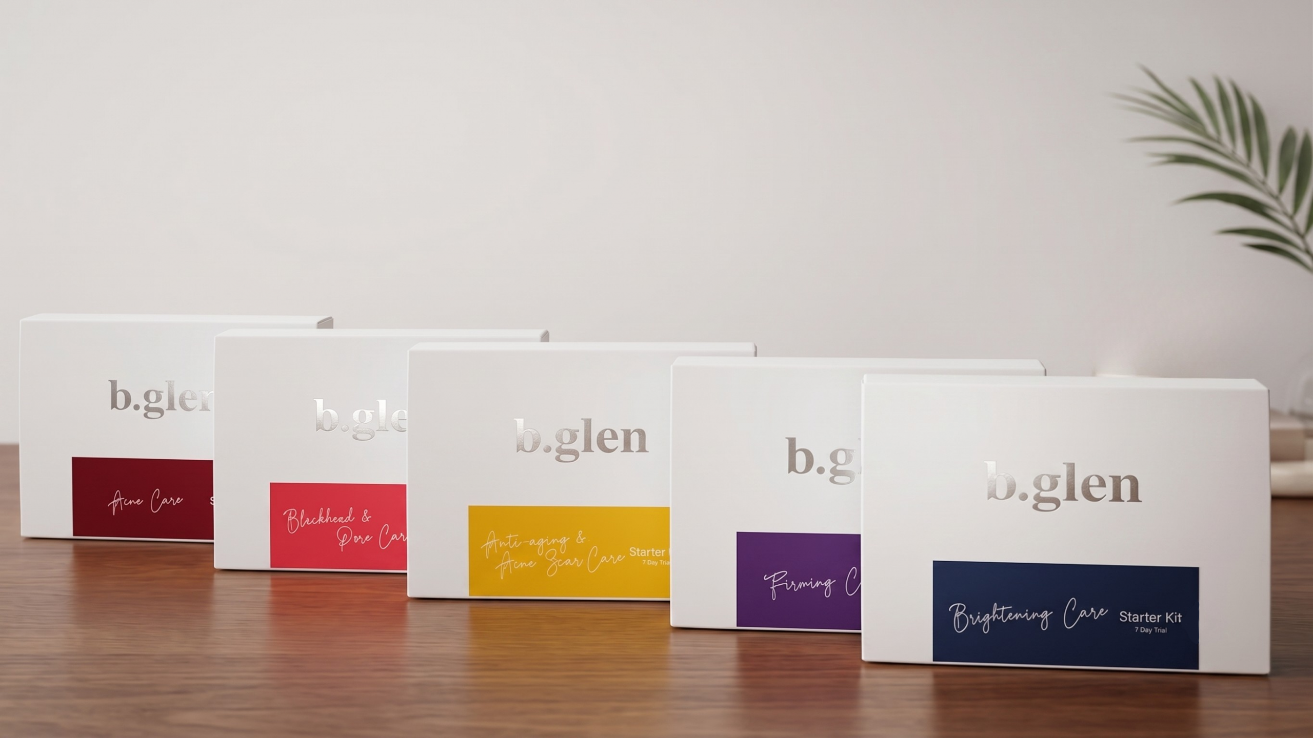 The five b.glen Starter Kits lined up: Acne Care, Blackhead & Pore Care, Anti-aging & Acne Scar Care, Firming Care, and Brightening Care